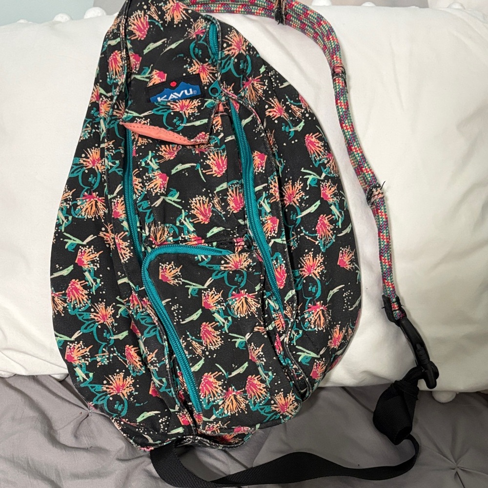 KAVU Women's Floral Sling Bag - Black and Pink with Teal Accents
